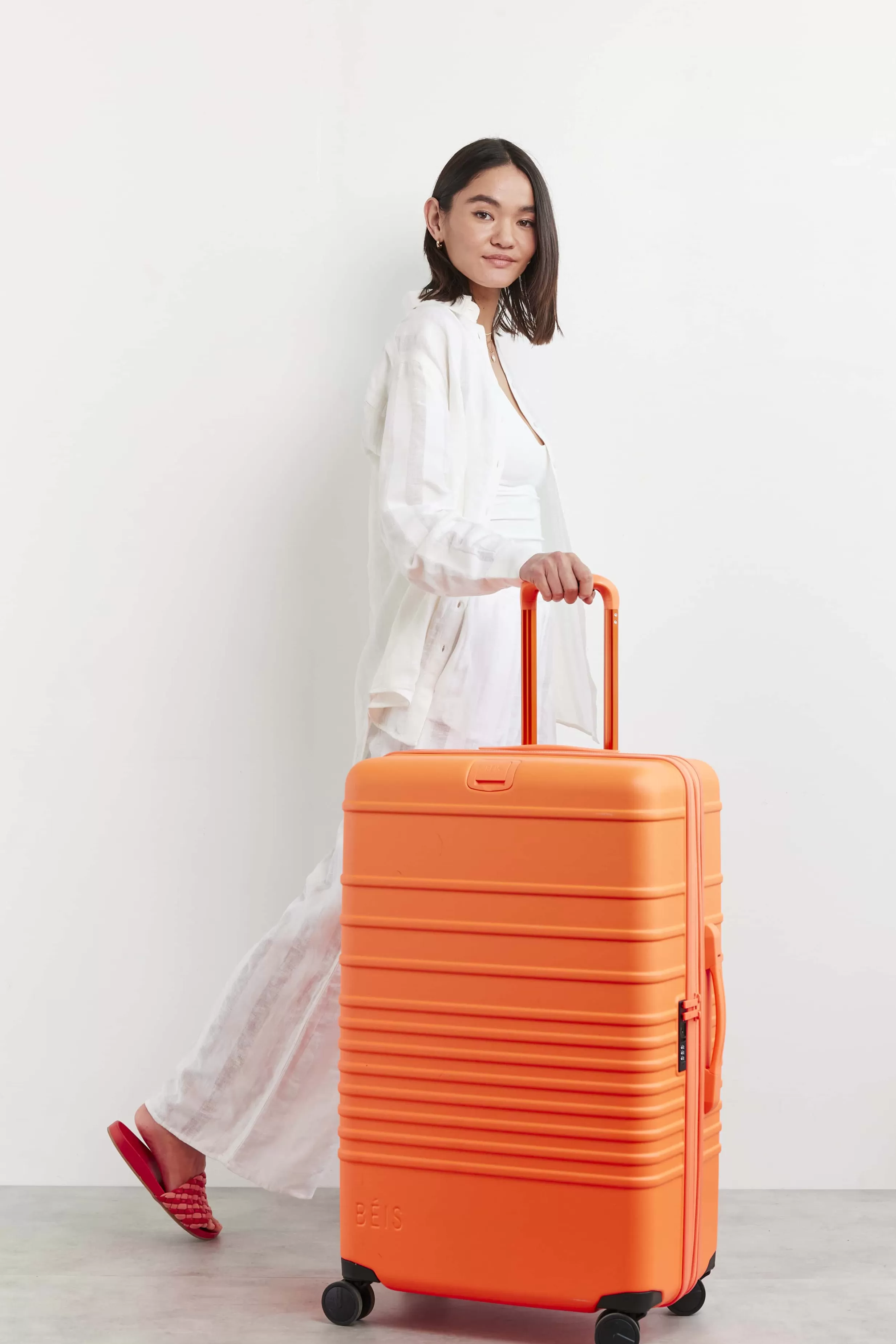 Fashion The 29" Large Check-In Roller In Creamsicle Hard-Sided Luggage