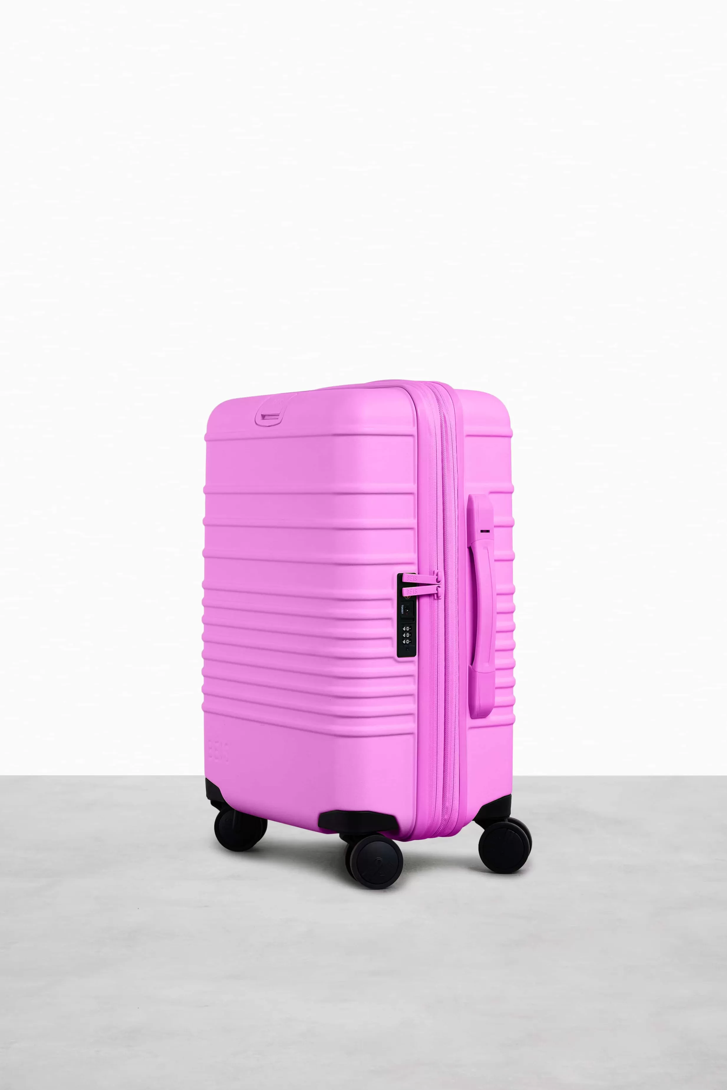 Fashion The Carry-On Roller In Berry Hard-Sided Luggage