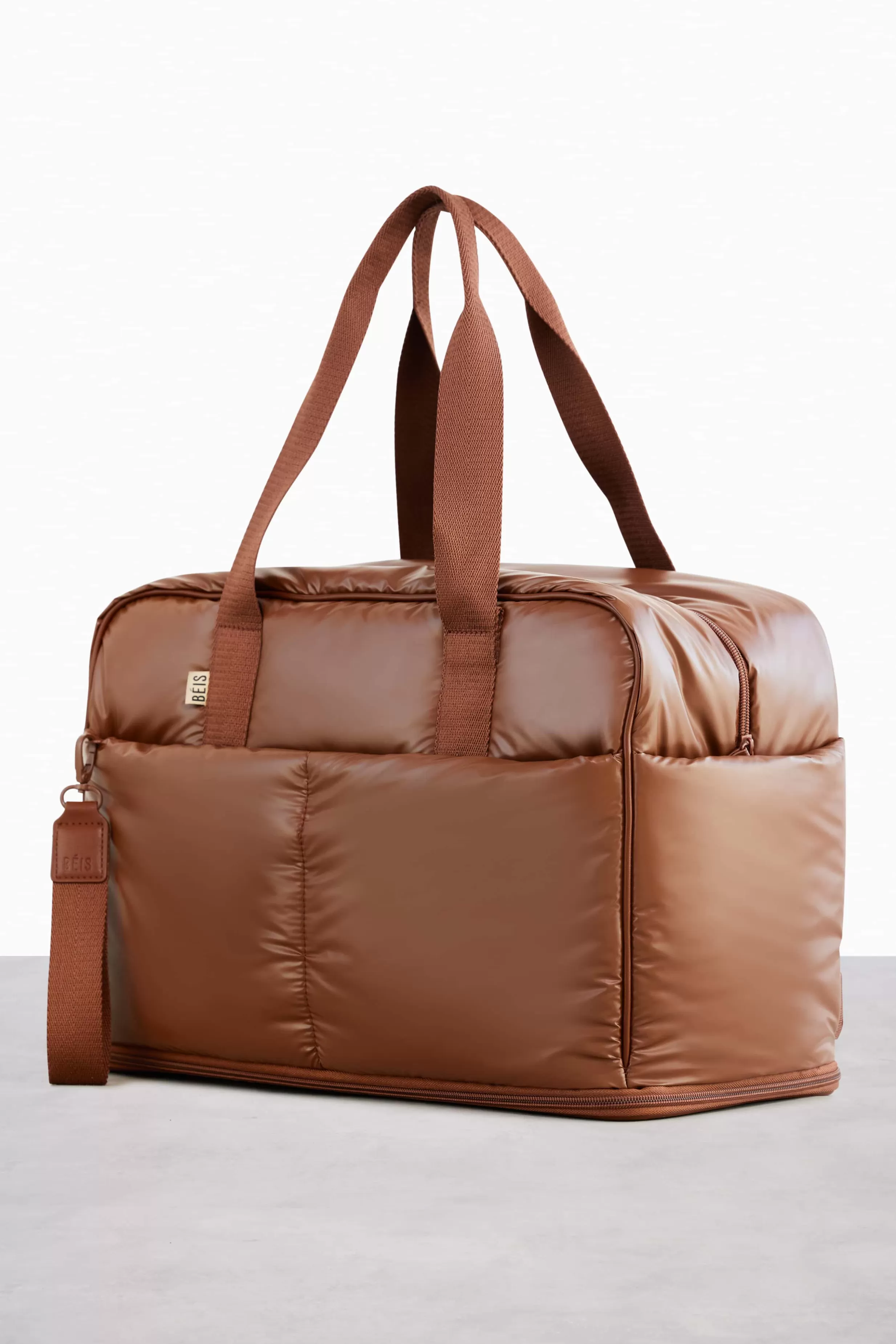 Flash Sale The Expandable Duffle In Maple Duffle Bags