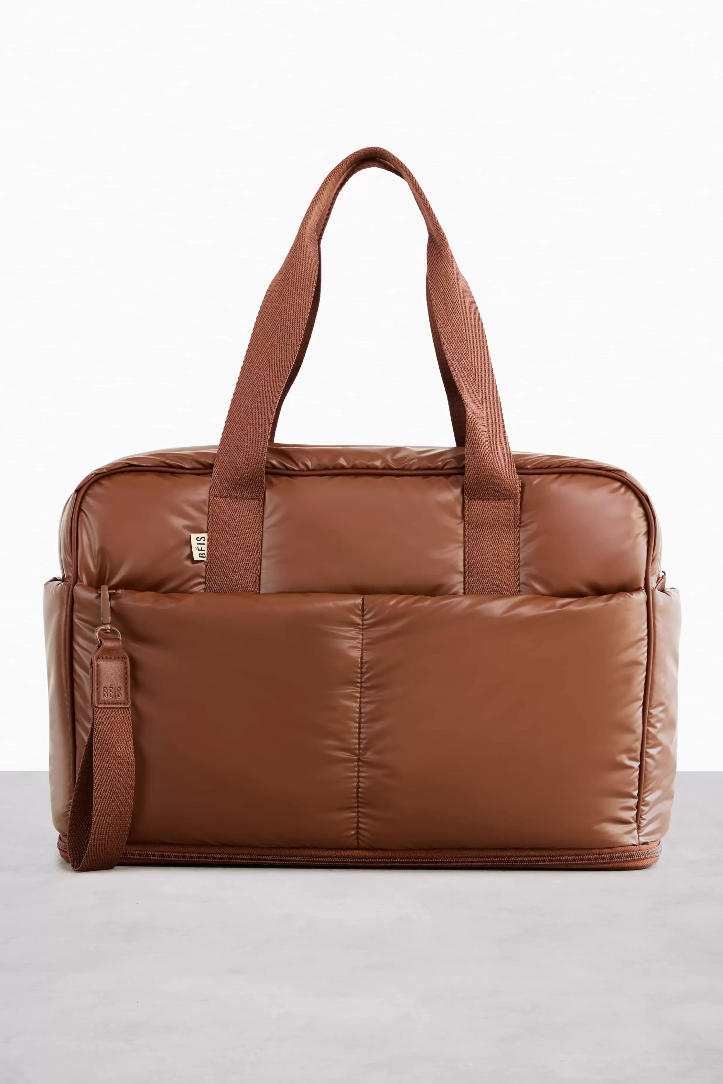 Flash Sale The Expandable Duffle In Maple Duffle Bags